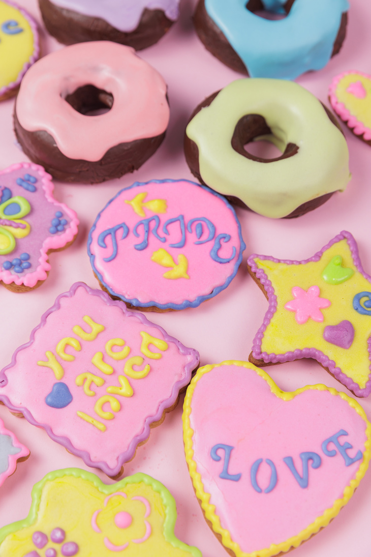 Pastel Icing Cookies and Donuts on Pink Background